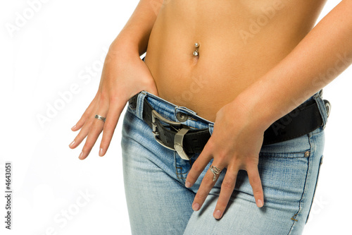 sexy  woman tan belly in jeans with belt photo
