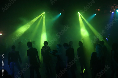 Dancing people in an underground club