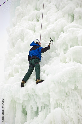Man Climbing an Ice Cliff