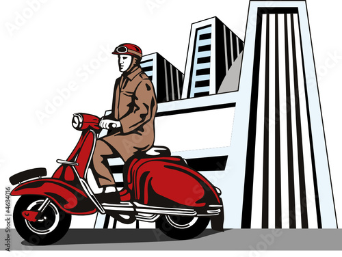 Man riding a scooter with buildings photo