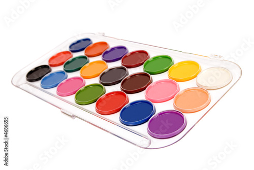 Angled view of colourful water colour paints