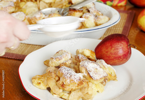 Czech sweet food - Apple pie and cook hand