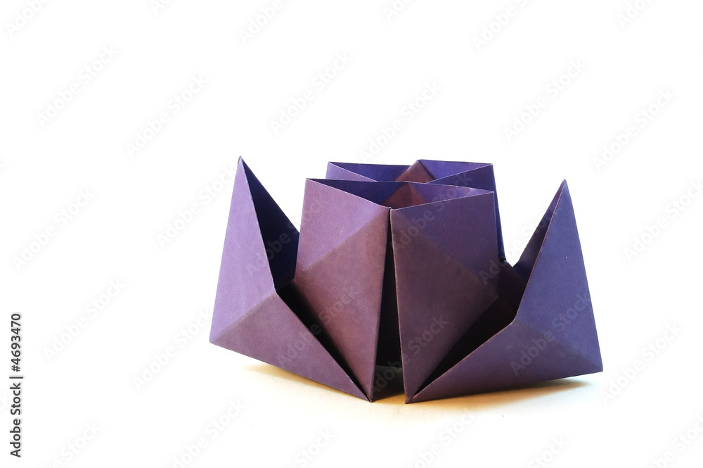 Dark blue paper toy-ship on a white background. Dark blue paper toy-ship on a white background.