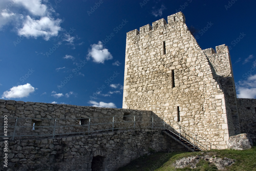 watch tower with blue sky in the background.