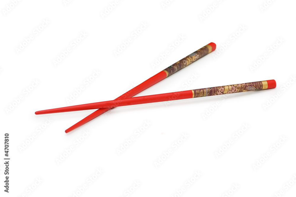 Red chopsticks isolated on the white background Red chopsticks isolated on the white background