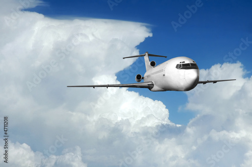 Airliner coming out of clouds
