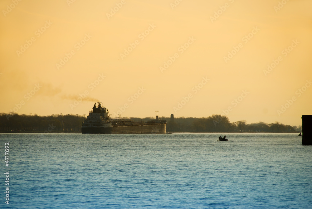 Freighter transporting cargo down the Detroit river