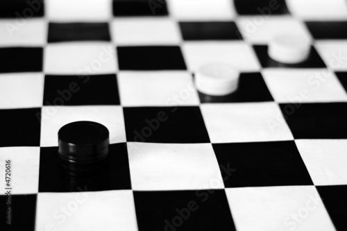 Black and white draughs or checkers(board game) - depth of field