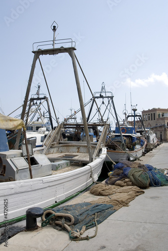 fishing boat moored in harbour