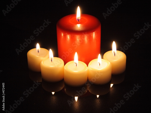 Christmas candle ligts with reflection