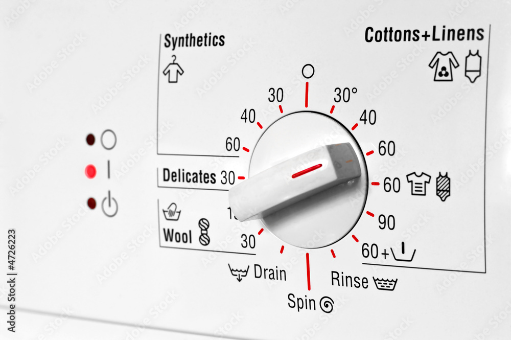 Front control panel of white washing machine Front control panel of white washing machine
