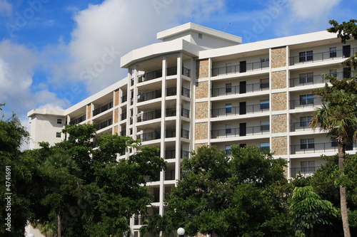 Tropical apartment building over looking a golf course