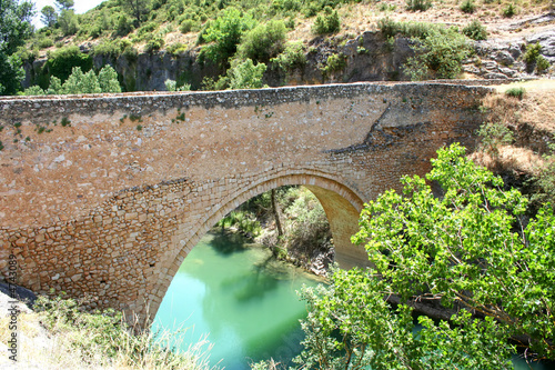 Romanic bridge, Puente de el Picazo, Alarcon, Spain photo