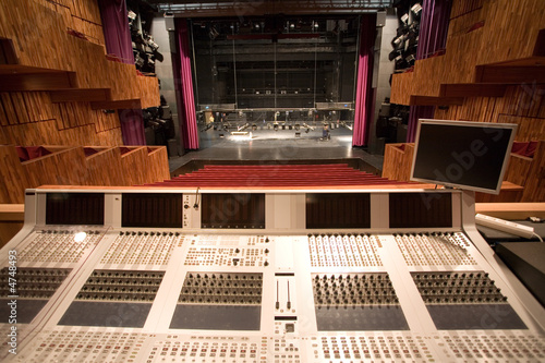 modern theater stage and an audio-mixer