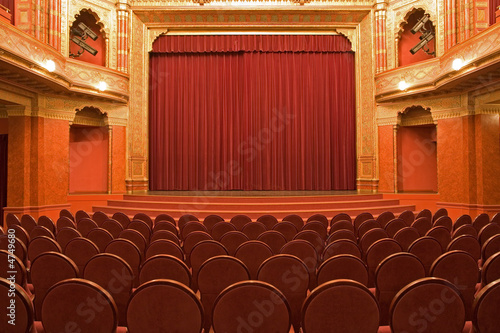 cinema stage with red velvet curtains