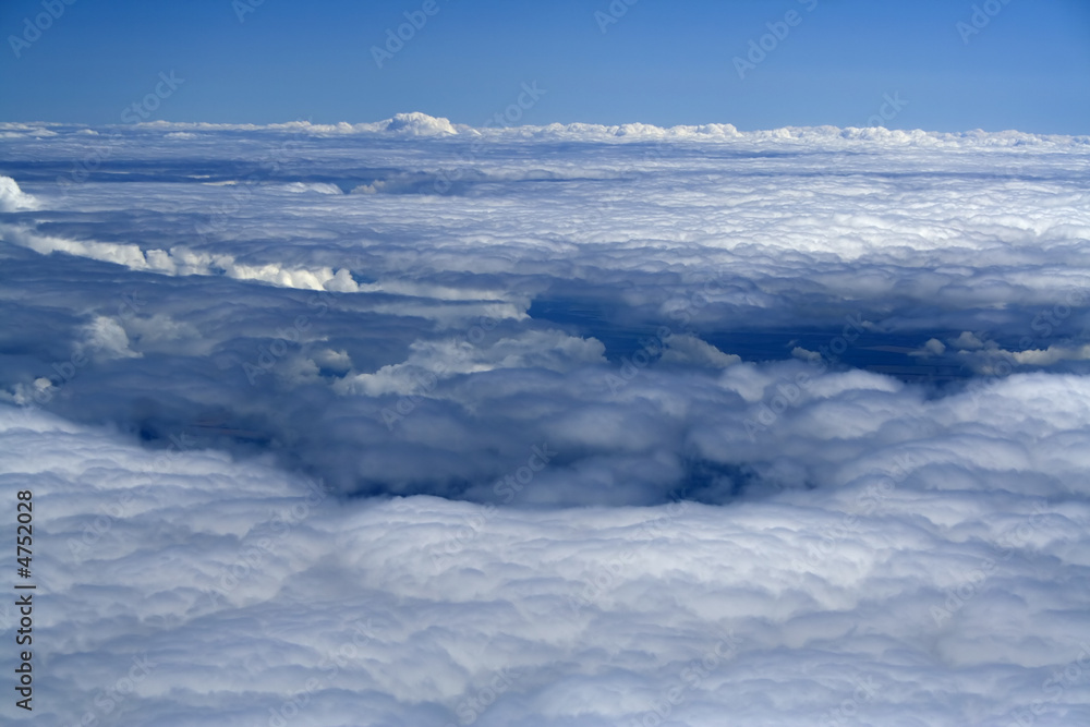 white snow plain of clouds