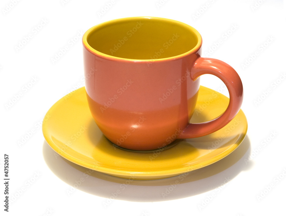 glazed pottery coffee cup and saucer with white background glazed pottery coffee cup and saucer with white background