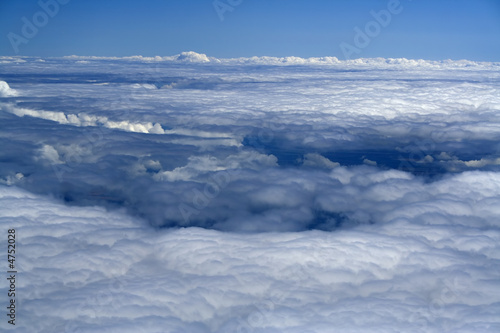 white snow plain of clouds