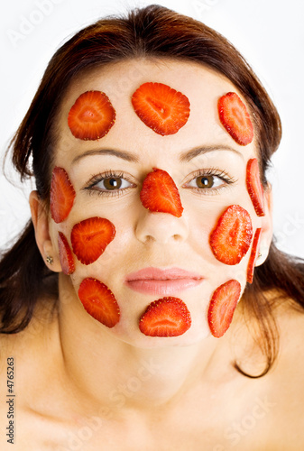 Fototapeta Naklejka Na Ścianę i Meble -  Young Female with Strawberry Mask