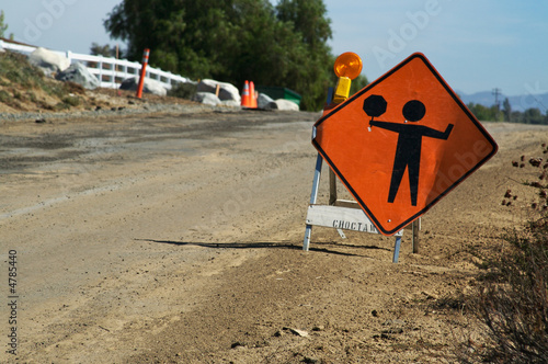 Signal ahead warning sign along the road side. photo