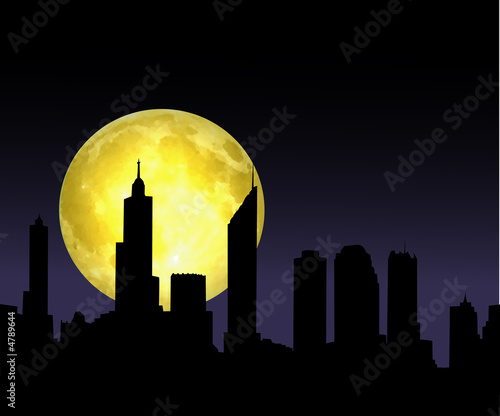 Fotografie Lever de lune sur la ville