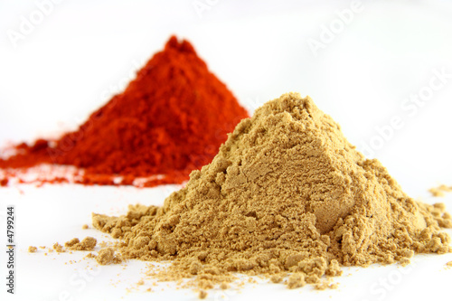 piles of ground ginger and paprika