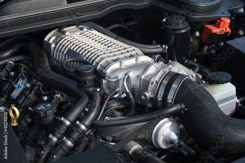 Powerful V8 supercharged car engine photo