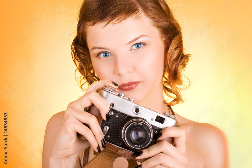 glamorous girl holding a camera glamorous girl holding a camera