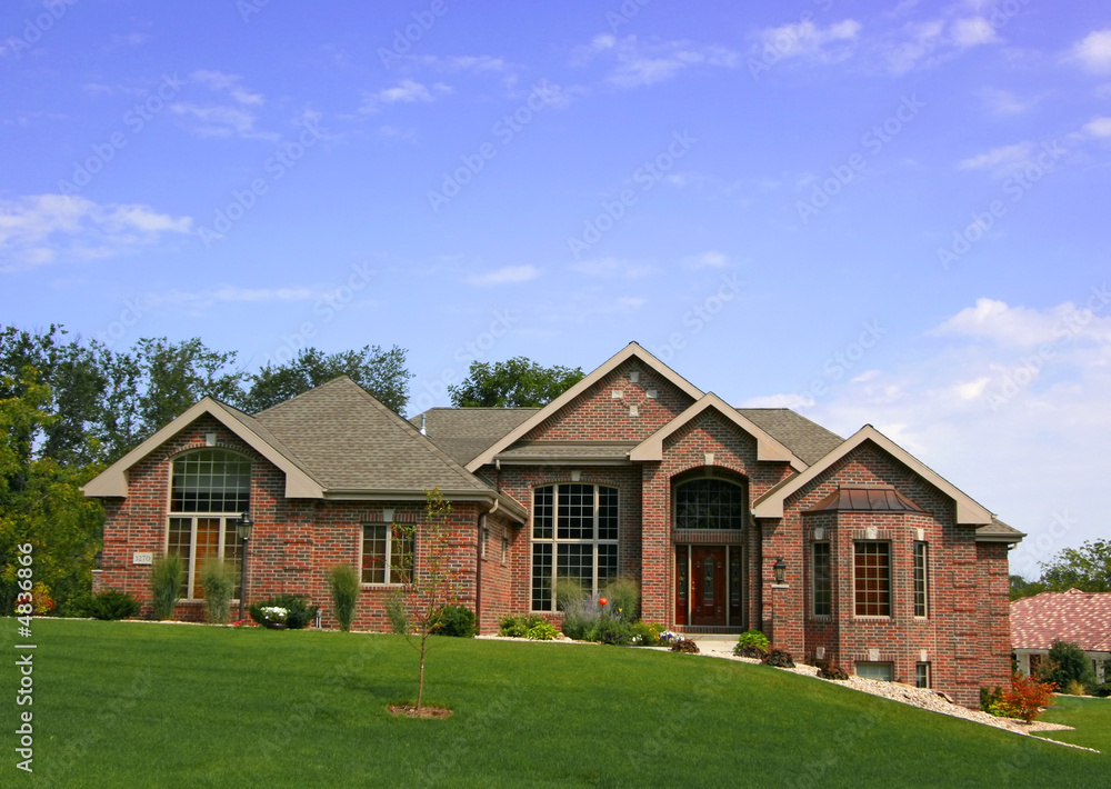 Luxurious executive home with blue sky