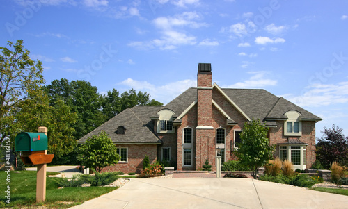 Luxurious executive home with blue sky