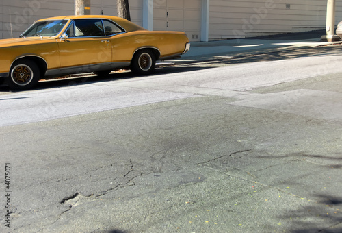 Photography Gold Muscle Car on Sloping Street
