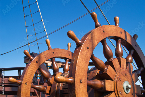 Double steering wheel of big sailing boat photo