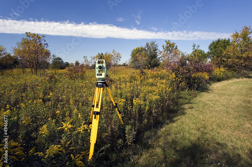 Theodolite set in the field photo