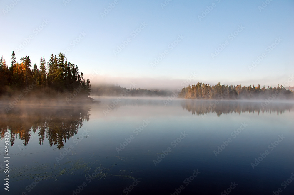 Fototapeta premium An autumn's landscape with fog