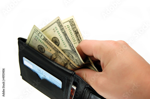 male hand taking dollars from black leather wallet