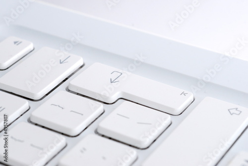 white computer keyboard enter