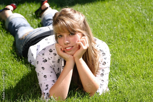 Teenage Girl Lying in the Grass