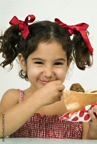 girl eating falafel