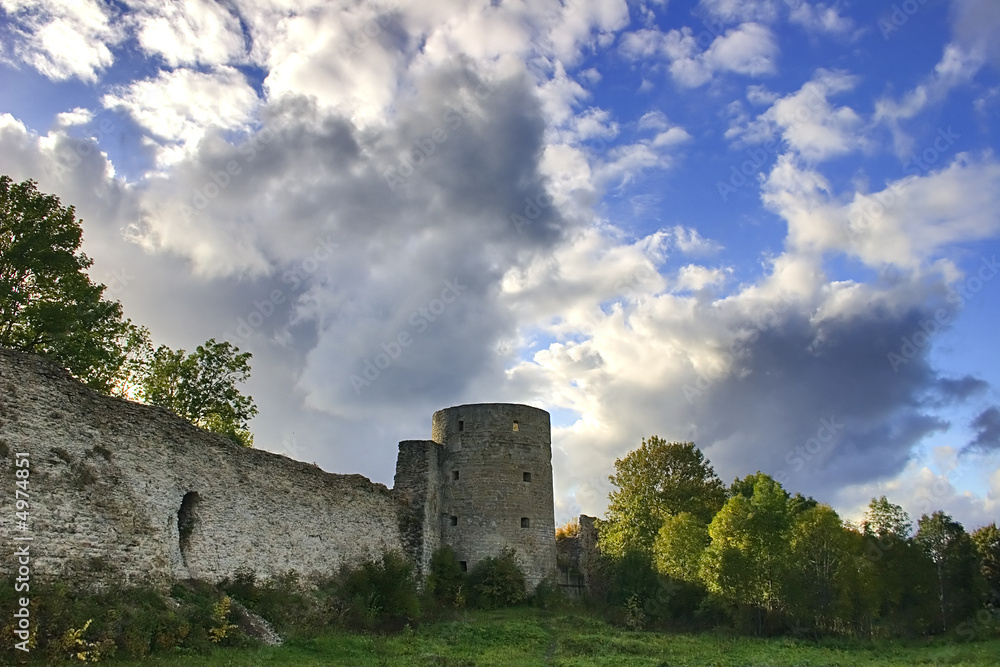 old tower under clouds