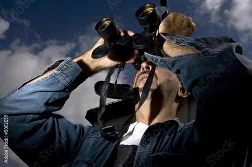 Man using binoculars