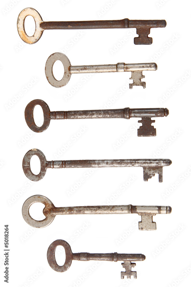 Six rusty old keys isolated on white. Six rusty old keys isolated on white.