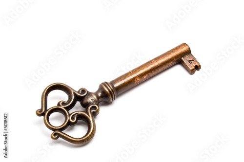 Antique key isolated on white © Xalanx