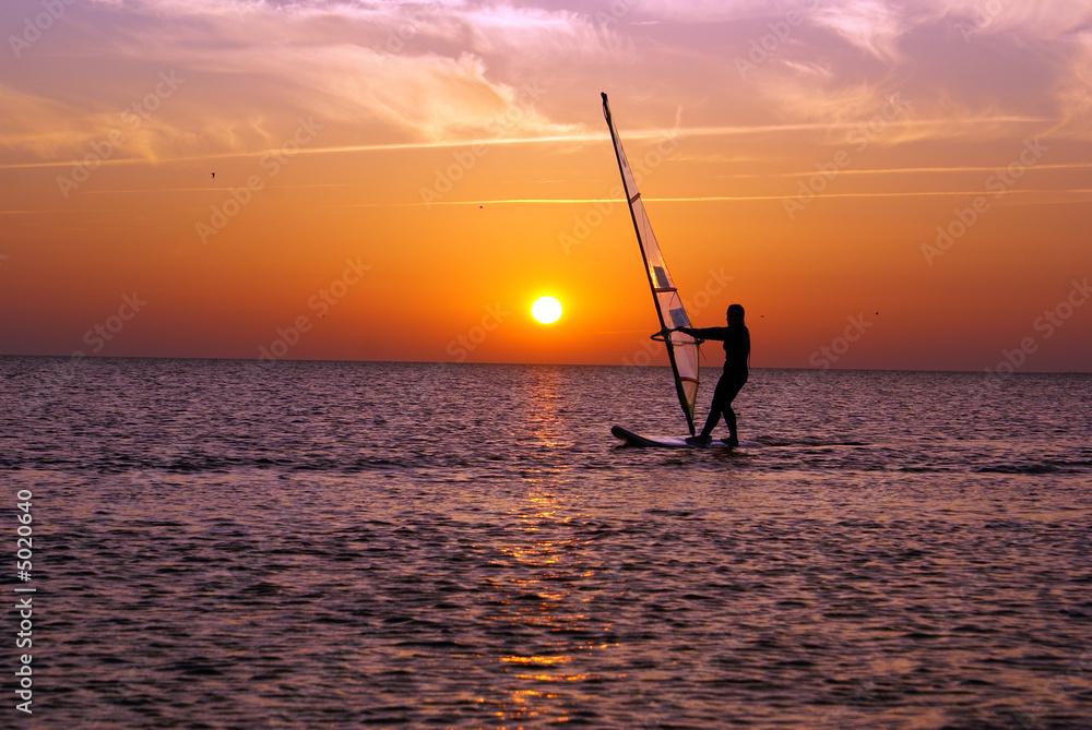 Windsurfing and sunset