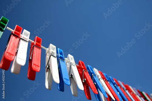 Clothesline with pegs photo