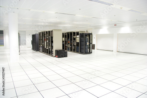 Two racks in the server room with the computers inside 