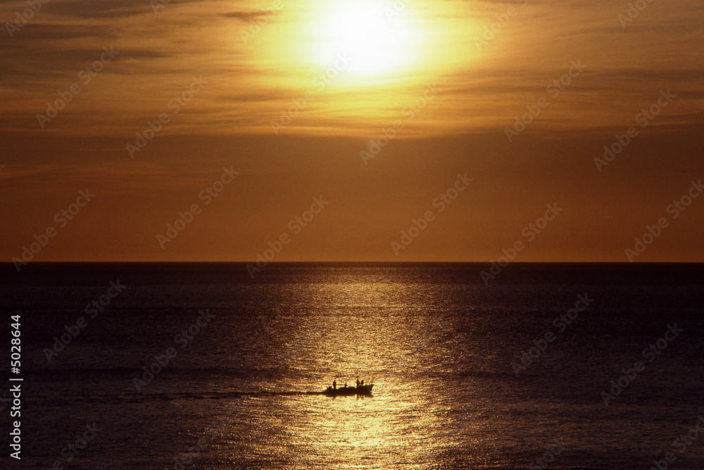 Fishing boat at sunrise. Gibraltar