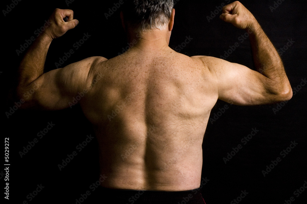 Old man flexing muscles