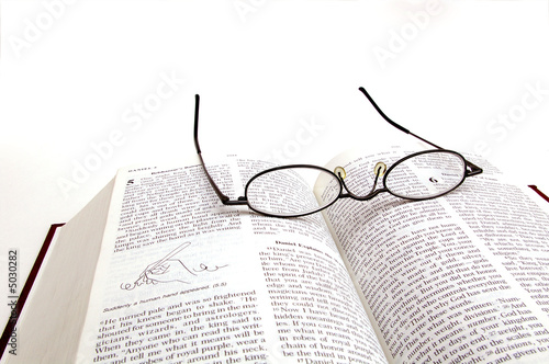 Glasses on Bible