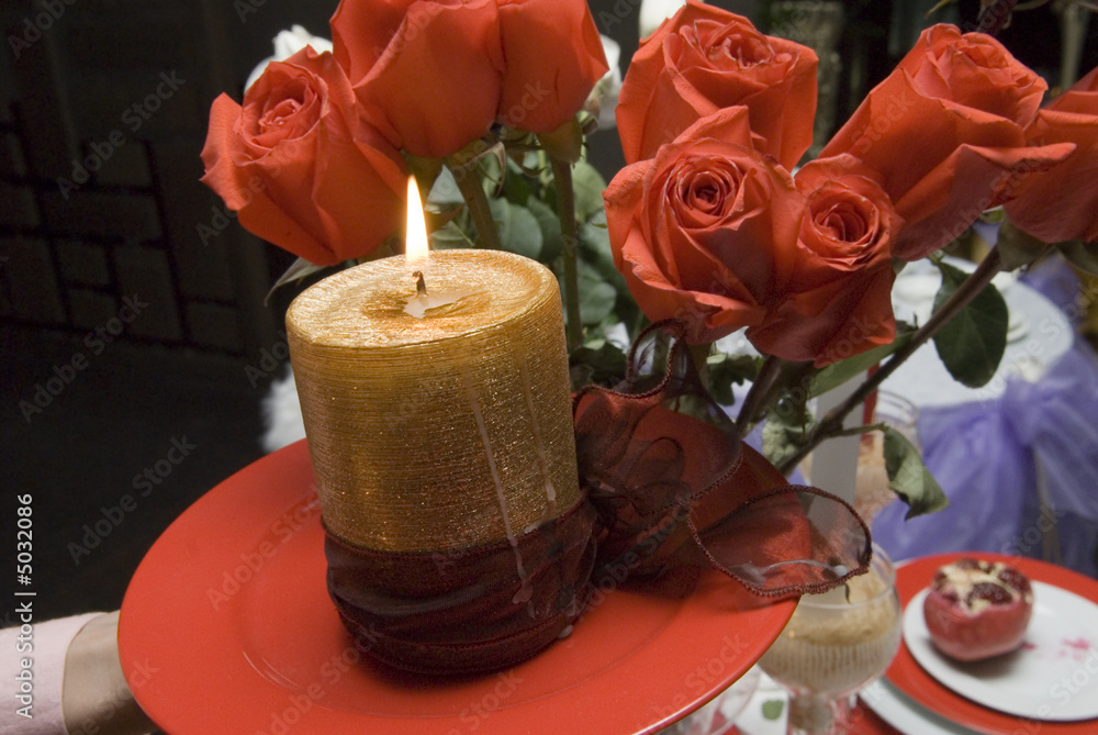 Obraz premium Candle and roses