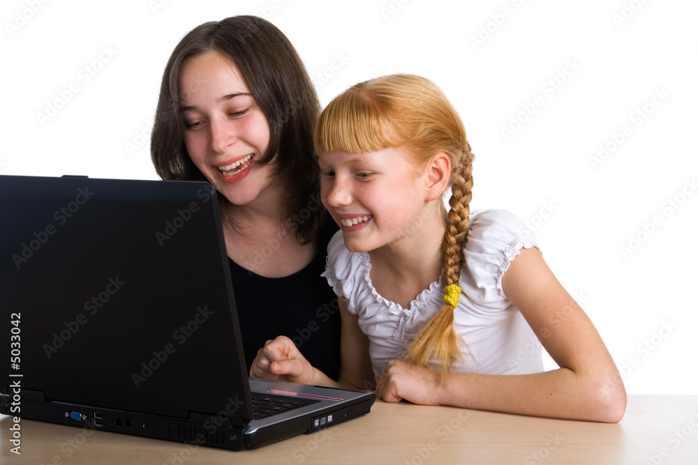 Young girls using a laptop